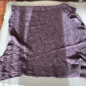Purple knitted shawl